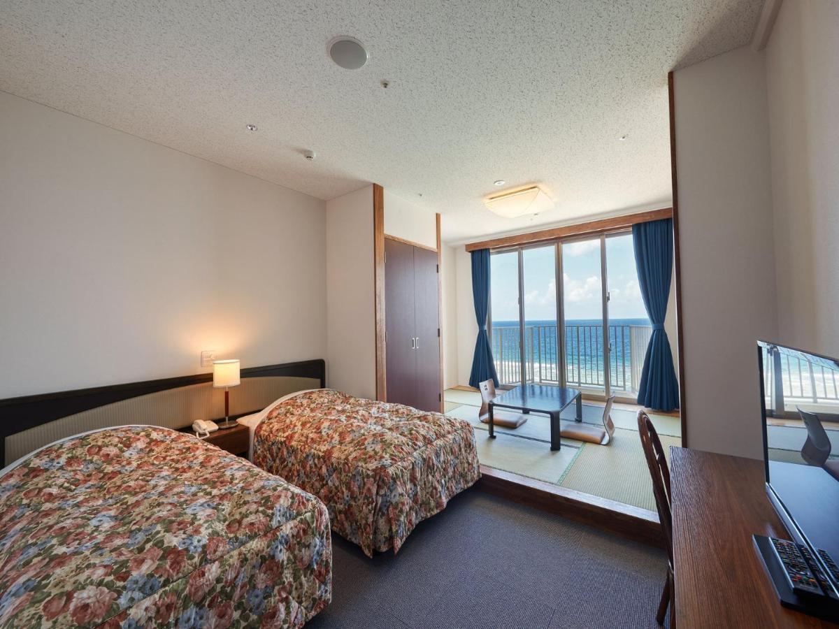 Hotel Miyuki Beach Onna Extérieur photo